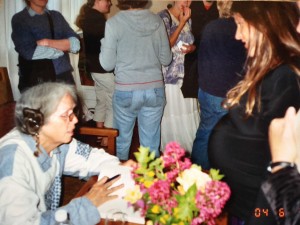 Ina May Gaskin, signing her then new book "Ina Mays Guide to Childbirth," and chatting with a pregnant mama at our Grand Opening.