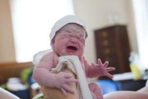 Just born baby crying out