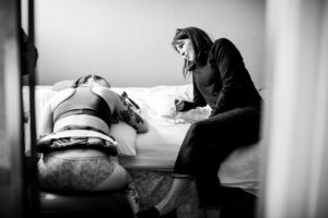mother giving birth at Bellingham birth Center